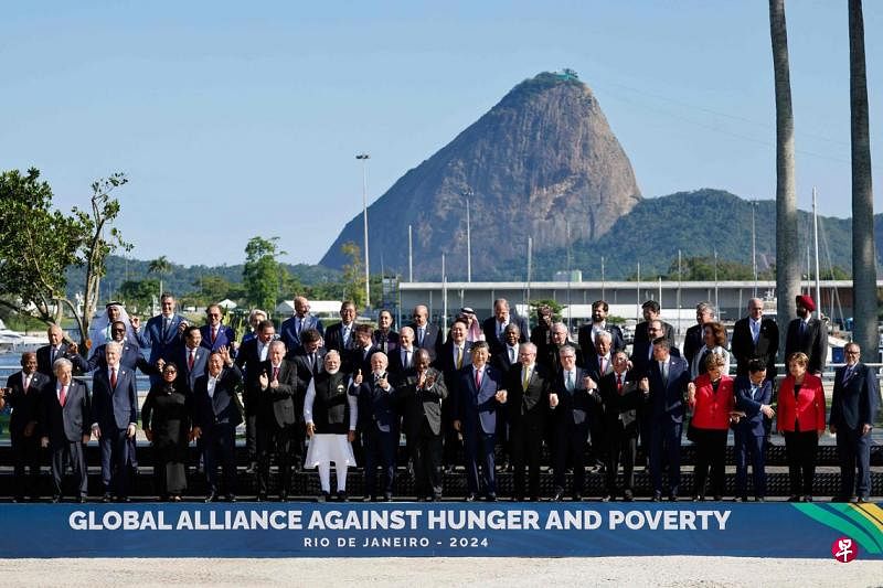 拜登错过G20领导人大合照二十国集团（G20）领导人星期一（11月18日）以巴西里约热内卢著名景点糖面包山为背景拍大合照，但即将卸任的美国总统拜登却不在其中